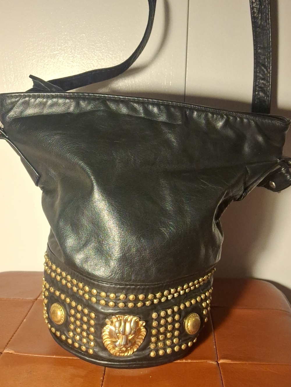 Vintage Black Leather Shoulder Bag with Gold Stud & Lion Accent
